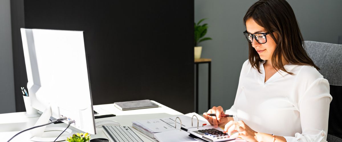 Young woman bookkeeping