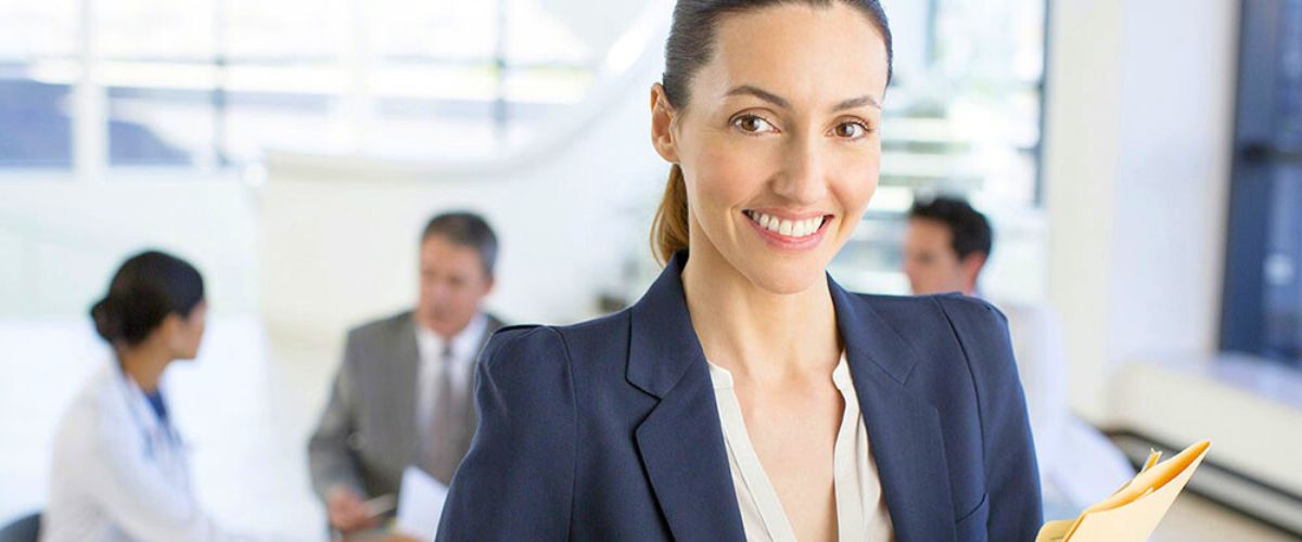 Smiling woman with dark blue jacket