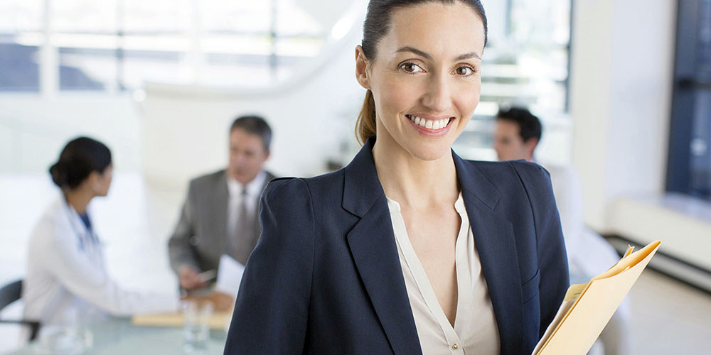 Smiling woman with dark blue jacket