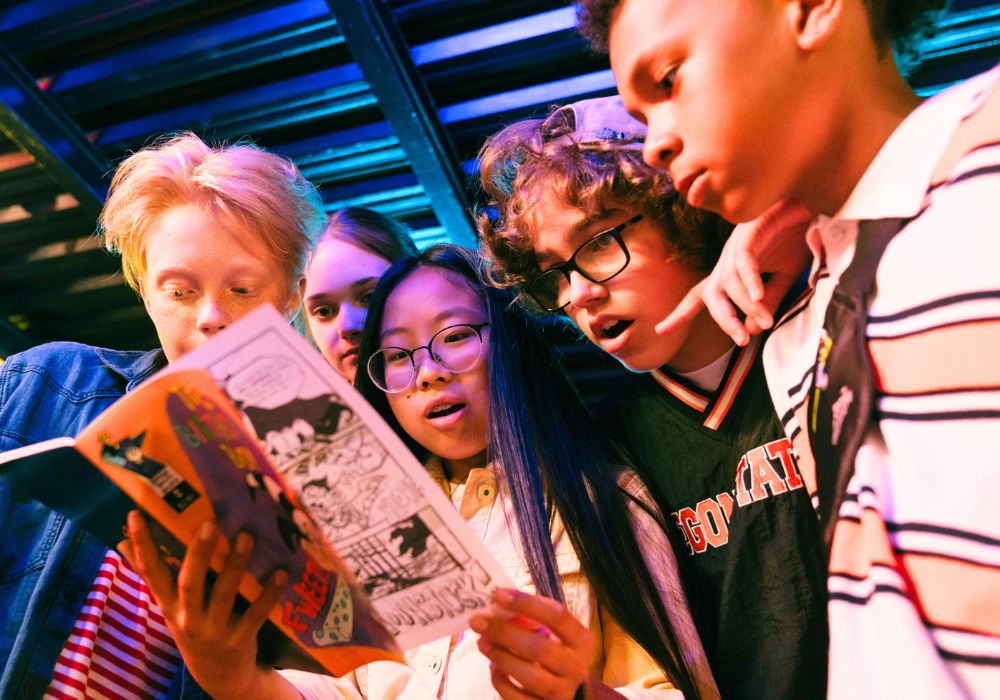 Kids reading a comic book together