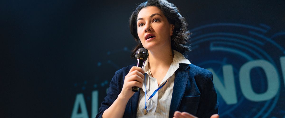 Executive speaking at a conference
