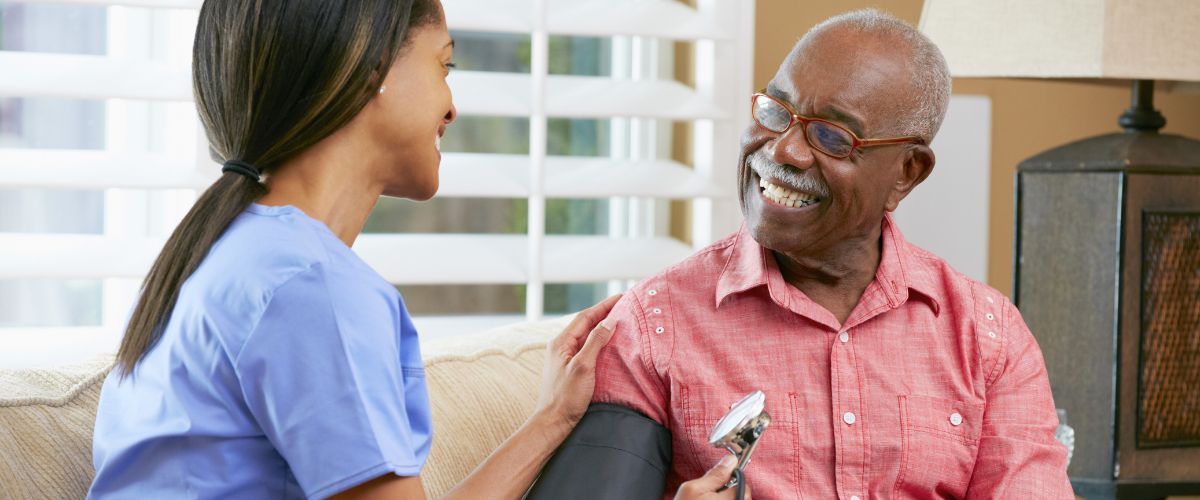 Medical assistant with a patient