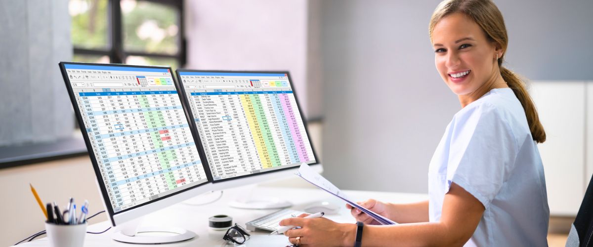Woman working with spreadsheets