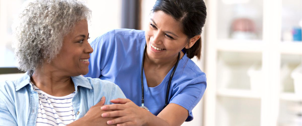 Nurse and happy patient