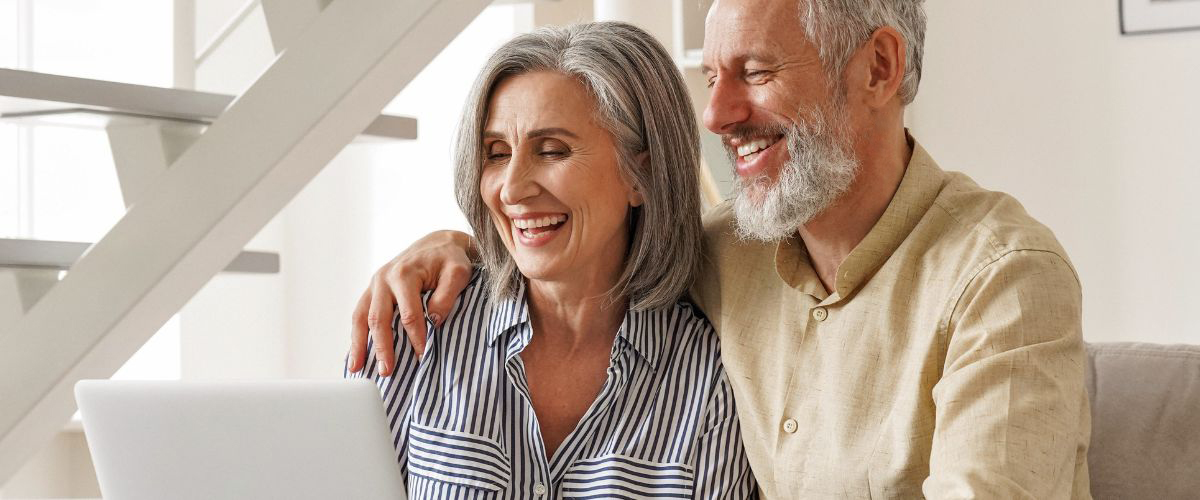 Senior couple learning online