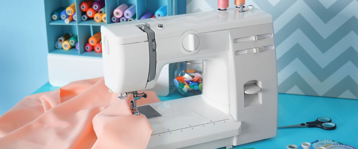 Sewing machine and colorful threads in a sewing room
