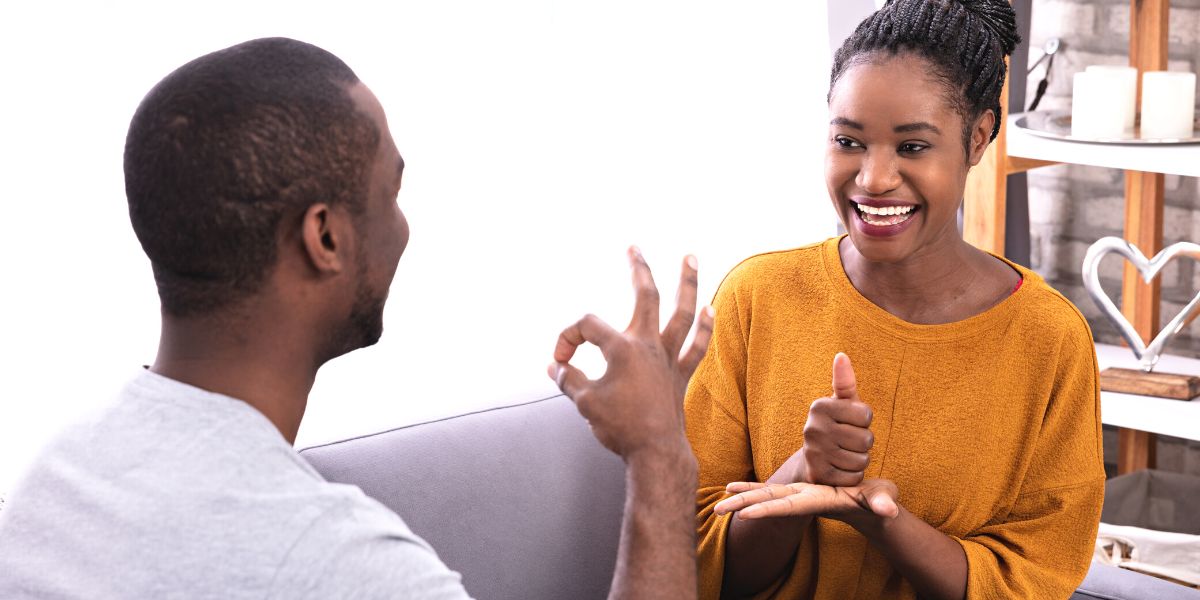 Woman and man using sign language