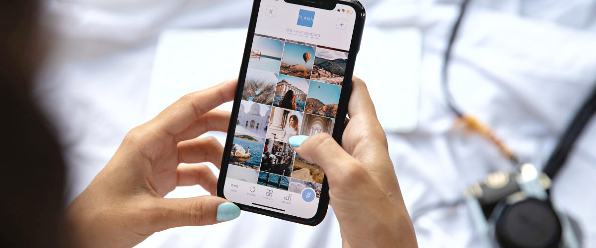Woman using social media with her smartphone