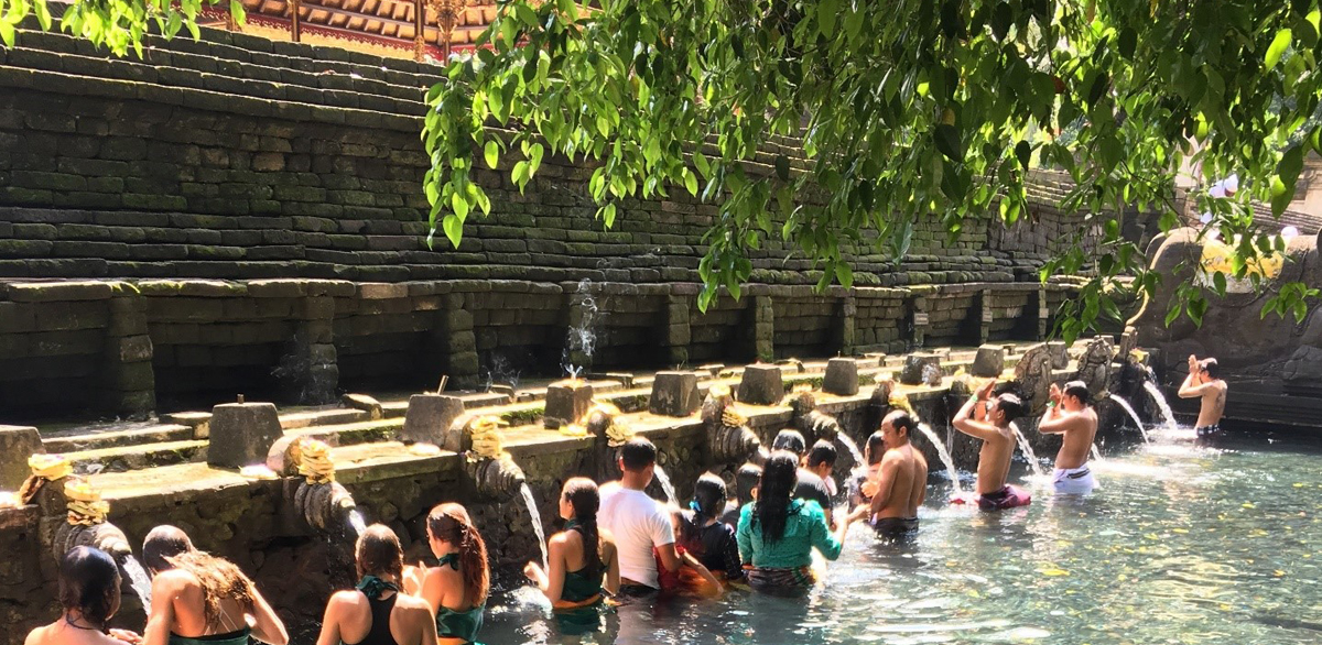 People purifying at a Balinese temple