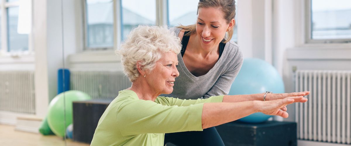 Female personal trainer with a client