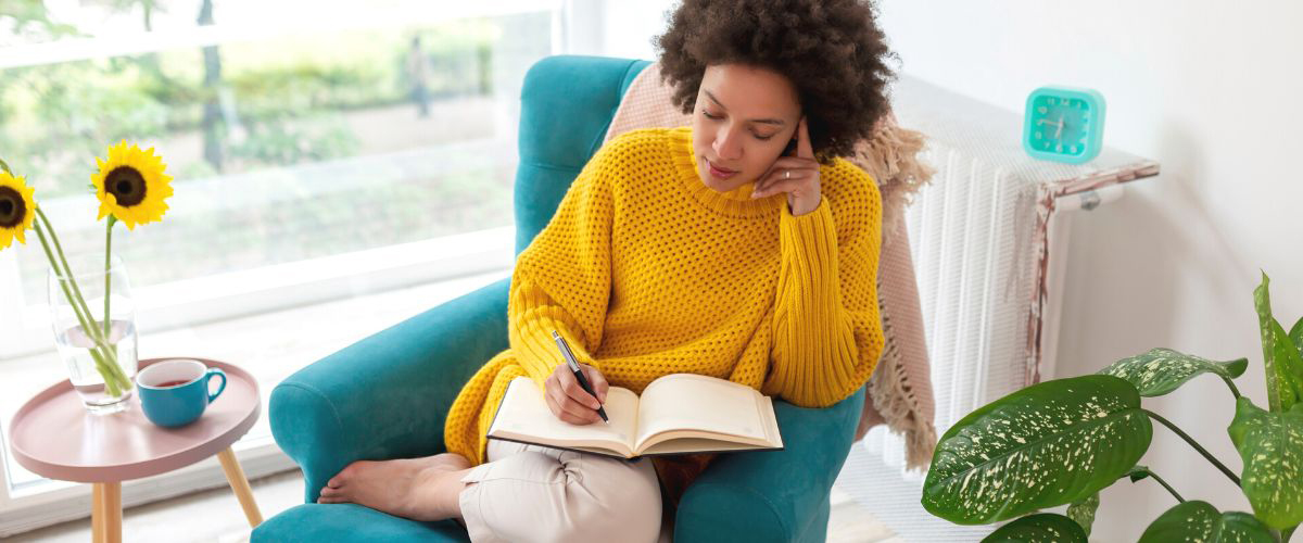 Woman writing a book