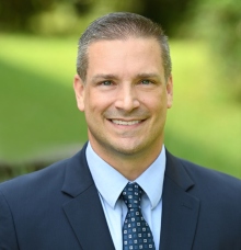 A smiling headshot of Vice President Brian Verkamp