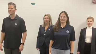 provost office staff standing at attention