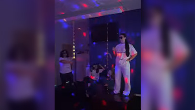Student life employees dancing to a disco