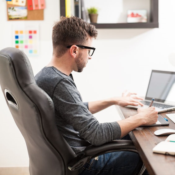 man sittingat an office desk