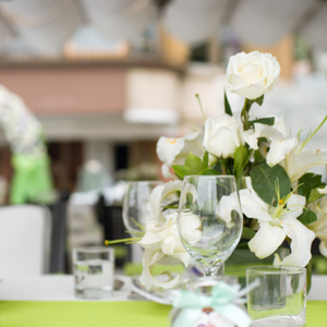 floral centerpiece and glasses on table