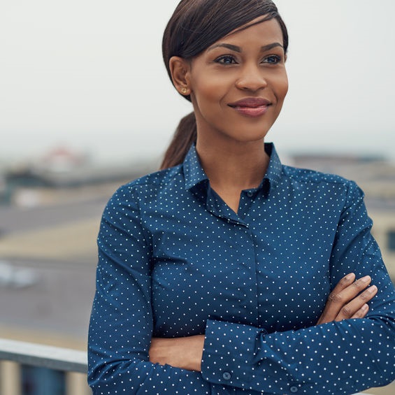 confident woman with arms crossed