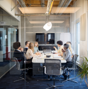 employees sitting in a conference room