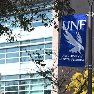 UNF Sign on post outside a building