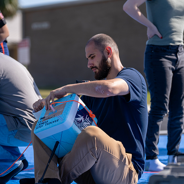 Student working on scientific equipment