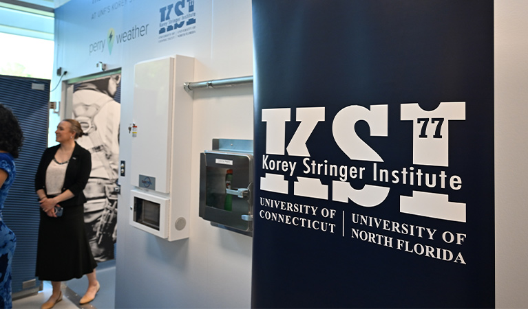 Korey Stringer Institute Banner outside the entrance to the new Perry Weather Heat Lab