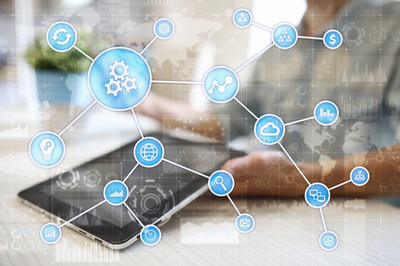 person holding a tablet with icons of digital connections overlayed