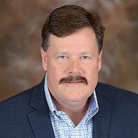 Headshot of Chris Abetz