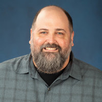 headshot of Mark Cooper