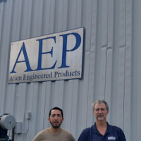 Tom and Juan in front of Alien Engineered Products