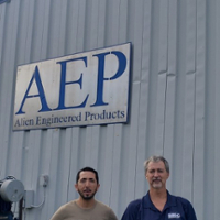 Tom and Juan in front of Alien Engineered Products 