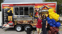 picture of client in front of food truck