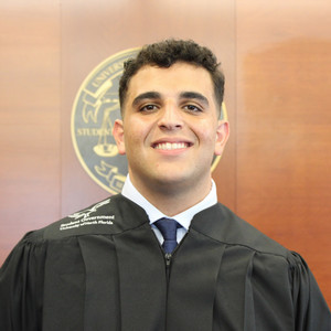Headshot of Associate Justice Ali Sartawi