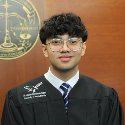 Headshot of Associate Justice Francis Felix Javier