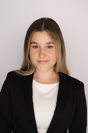 headshot of lend a wing marketing coordinator genevieve