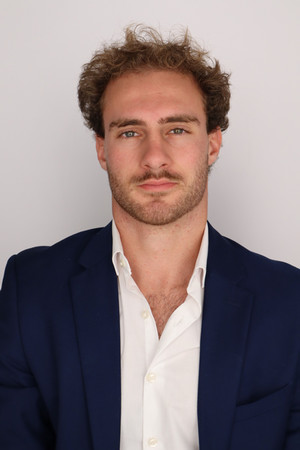 headshot of lend a wing coordinator Pericles