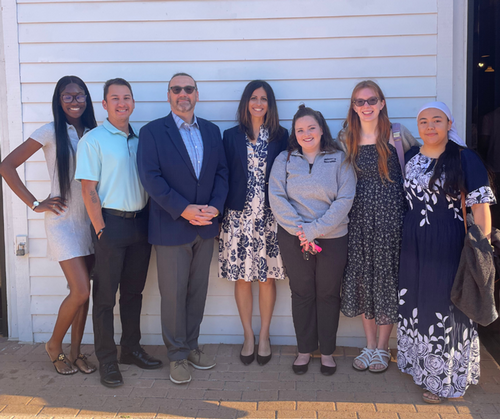Faculty members and students pose while attending Children's Day at the Florida Capitol.