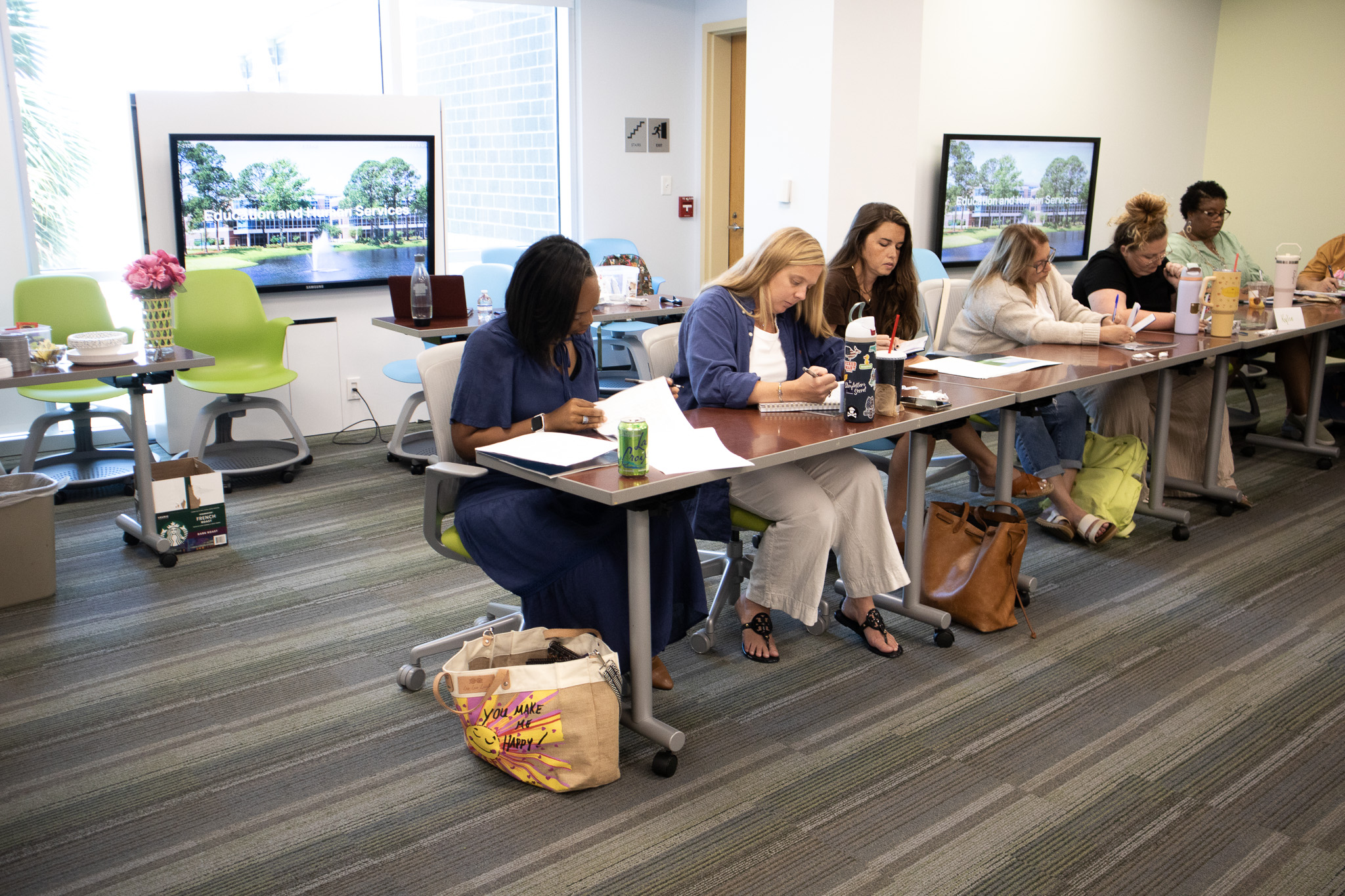 Students write during the Seven Bridges Summer Institute. 