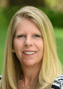 Headshot of Jennifer Kane smiling