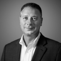 Ronald Harnek headshot in black and white