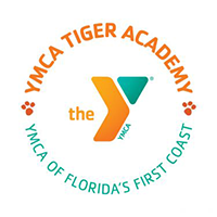 YMCA Tiger Academy logo with a stylized orange and green YMCA “Y” and circular text reading “the YMCA TIGER ACADEMY” and “YMCA OF FLORIDA’S FIRST COAST.”