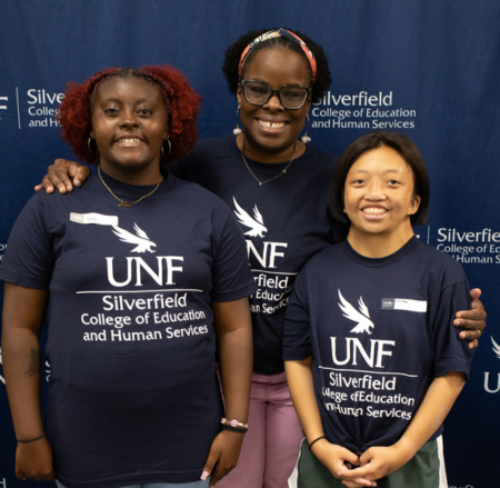 USoar students and Dr. Jenkins wearing Silverfield t-shirts