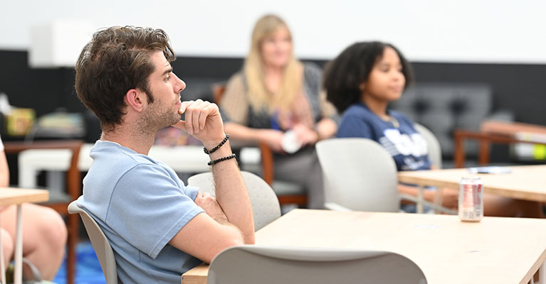 student listening in class