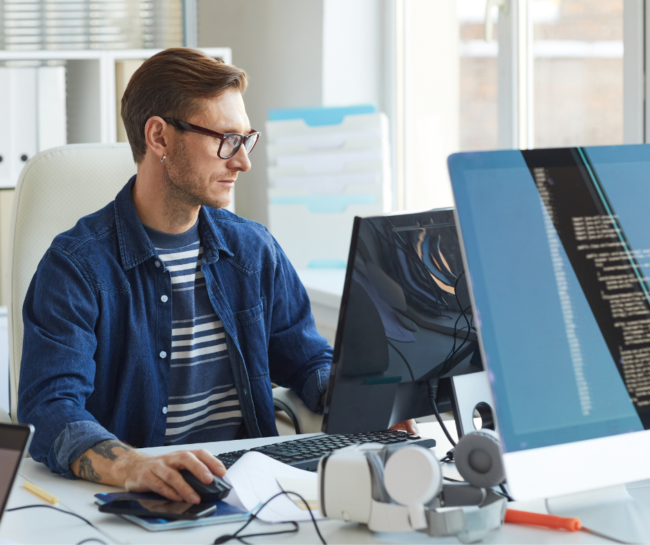 A man giving a presentation in front of a PowerPoint about AI