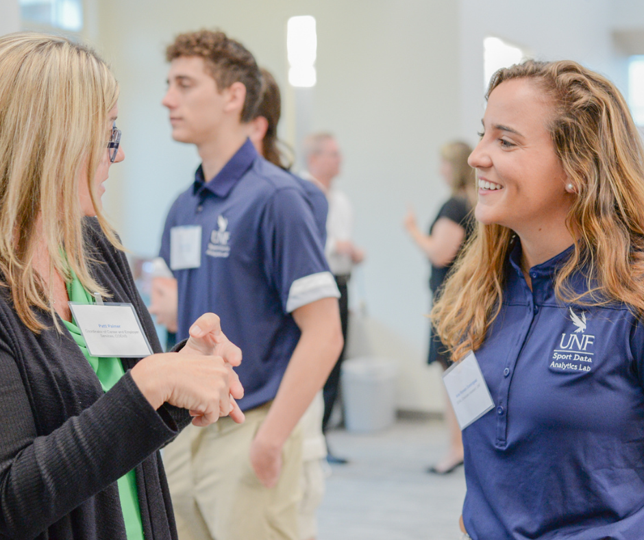 Sport Management student talking with advisor