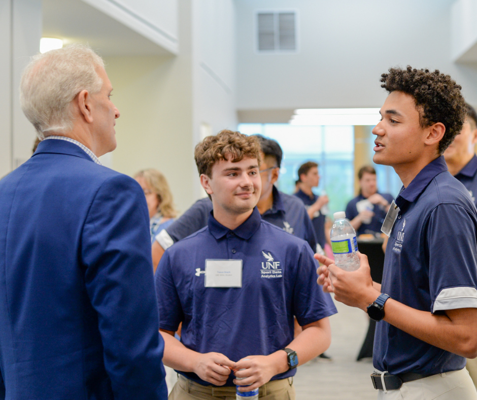 UNF sport management students networking with mentors