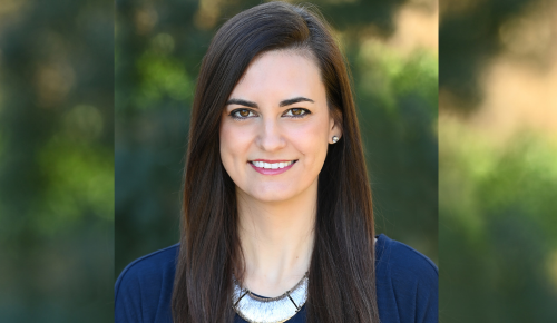Headshot of Amanda Pascale with background of blurred greenery