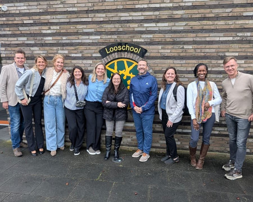 UNF faculty group photo at Looschool 