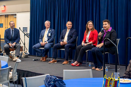 Local education professionals engaged in panel discussion at FEA conference