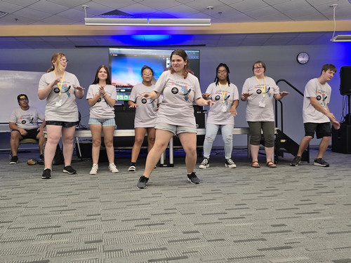 DHH students dancing in a COEHS classroom