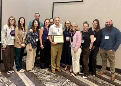 Faculty and doctoral students from SPIDERS at conference